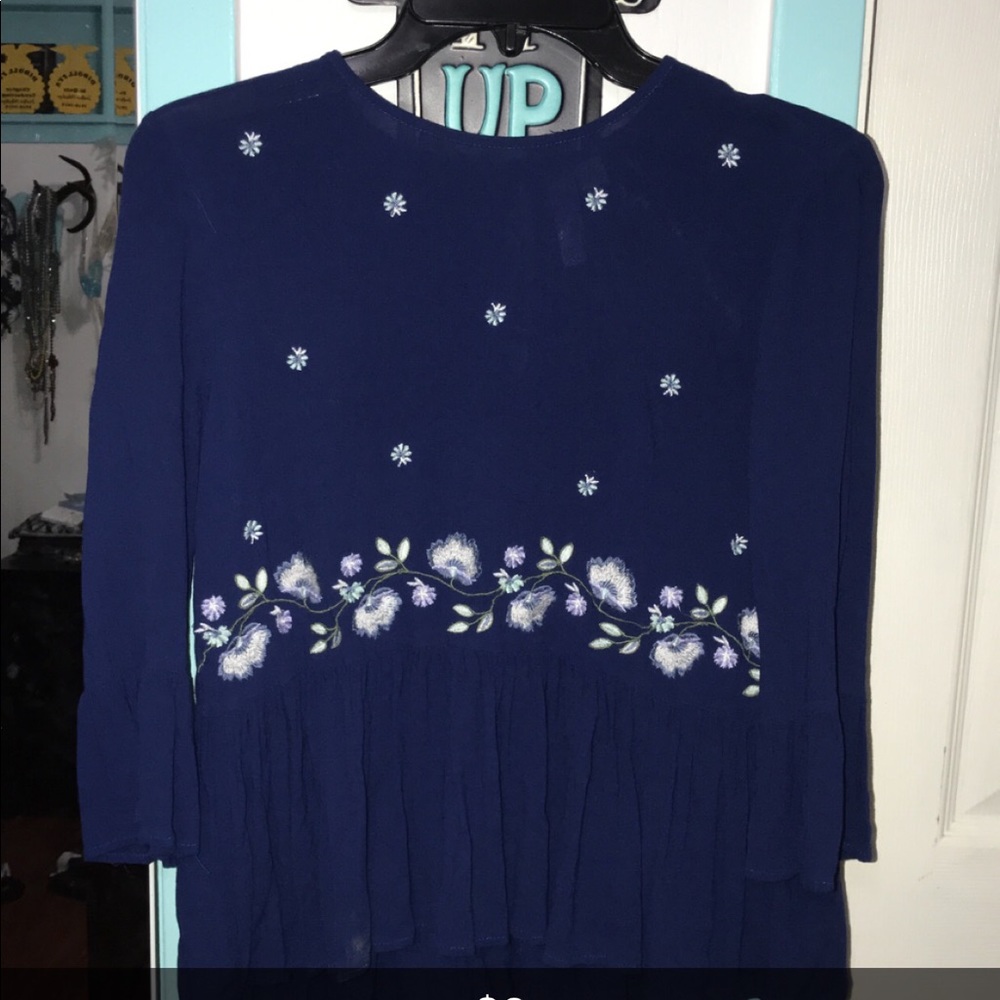 Blue blouse with flowers